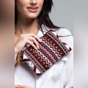Handmade patterned clutch.